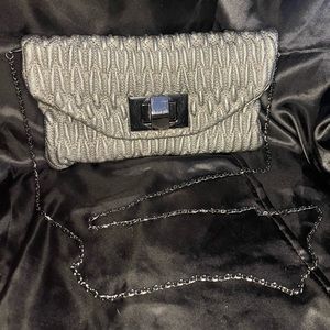 Super cute silver Miztique clutch or crossbody purse